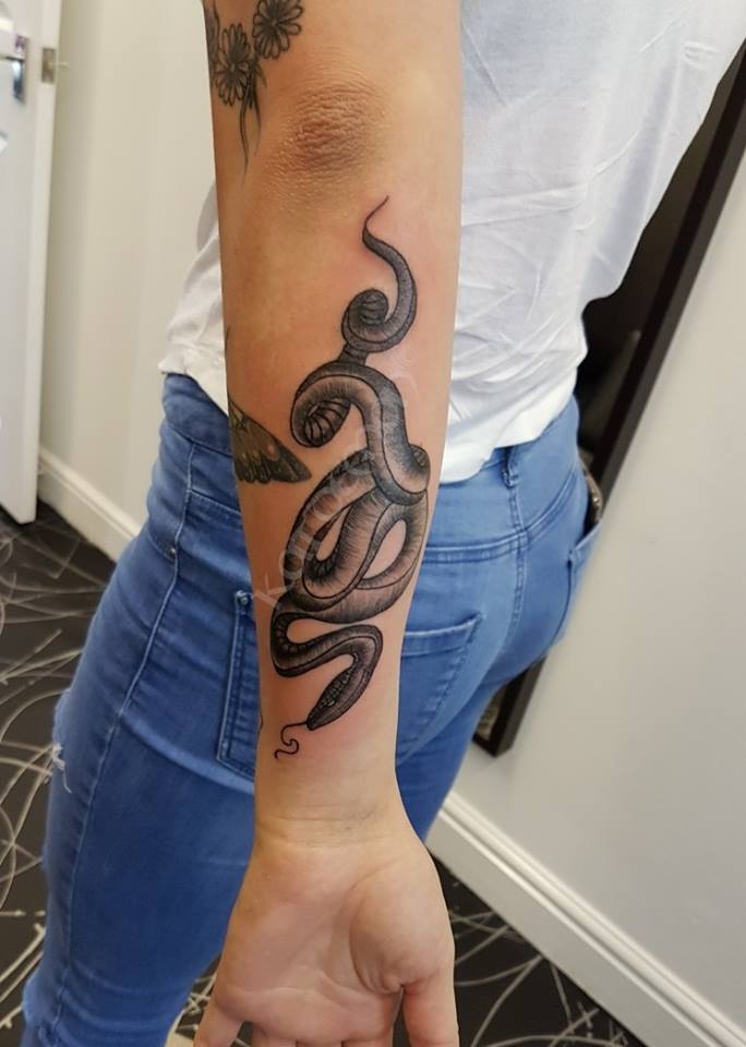 snake forearm tattoos